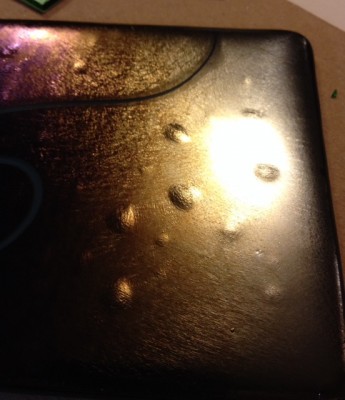 Here is a photo of the bumps. The line that looks kind of like a crack is actually a piece of vitrigraph so ignore that.