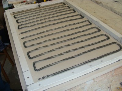 DSC02479.jpg (116.17 KiB) Viewed 54499 times new lid liner viewed from underneath with elements reinstalled. The elements are held snug to the liner with 'u' shaped wire loops poked through from the underside and bent at 90 deg. on top so they don't dislodge.